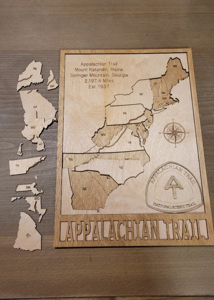 Wooden map of the Appalachian Trail on a wooden surface